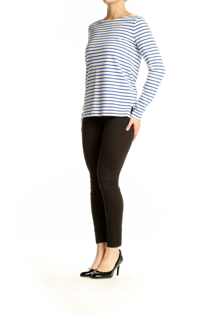 Front view of J.Crew blue and white striped long-sleeve cotton top with boat neckline