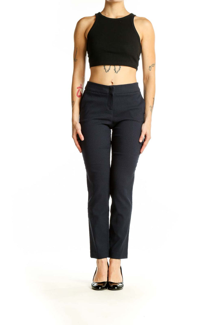 Front view of Dalia black textured slim fit trousers on model