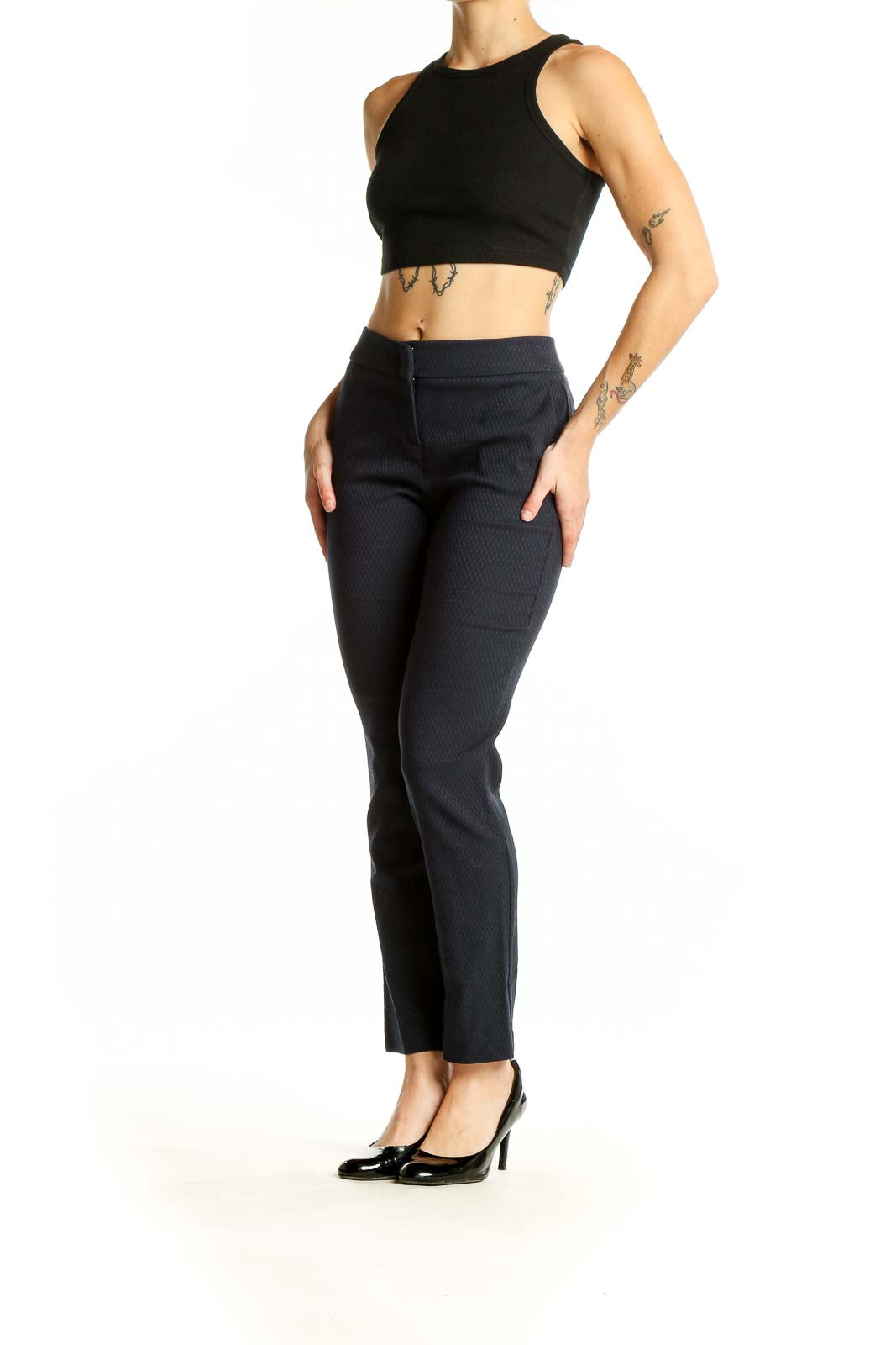 Front view of Dalia black textured slim fit trousers on model