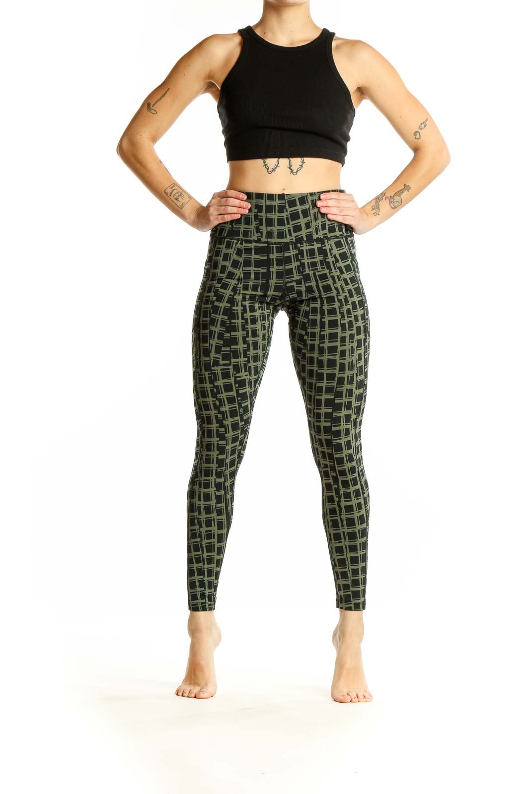 Front view of olive green Calvin Klein activewear leggings with geometric print