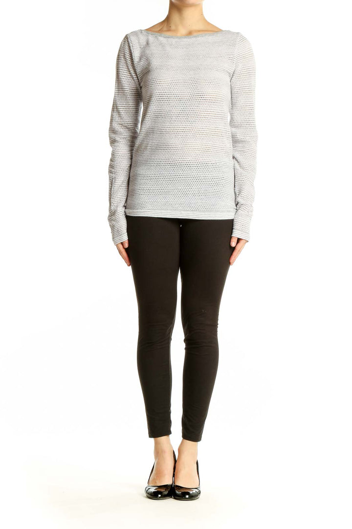 Front view of gray textured long sleeve athletic top by Athleta