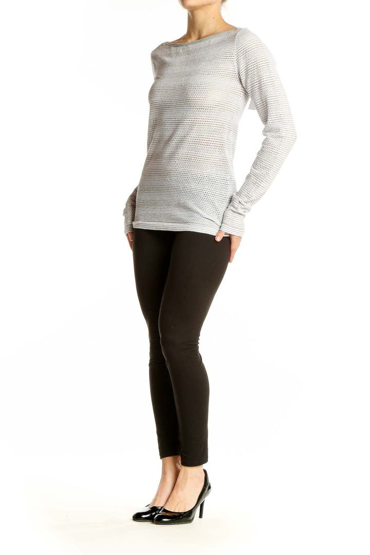 Front view of gray textured long sleeve athletic top by Athleta