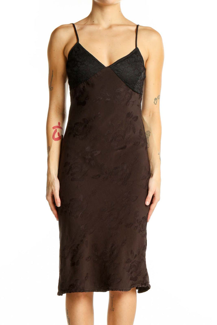 Front view of Rouje Paris brown satin slip dress with V-neck and spaghetti straps