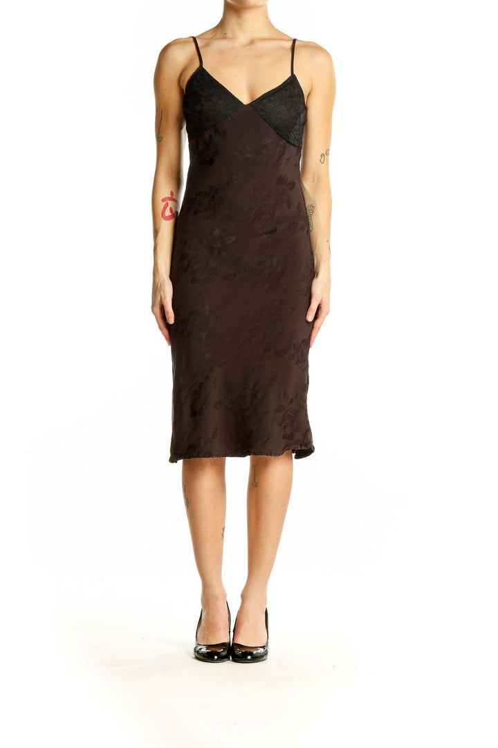 Front view of Rouje Paris brown satin slip dress with V-neck and spaghetti straps