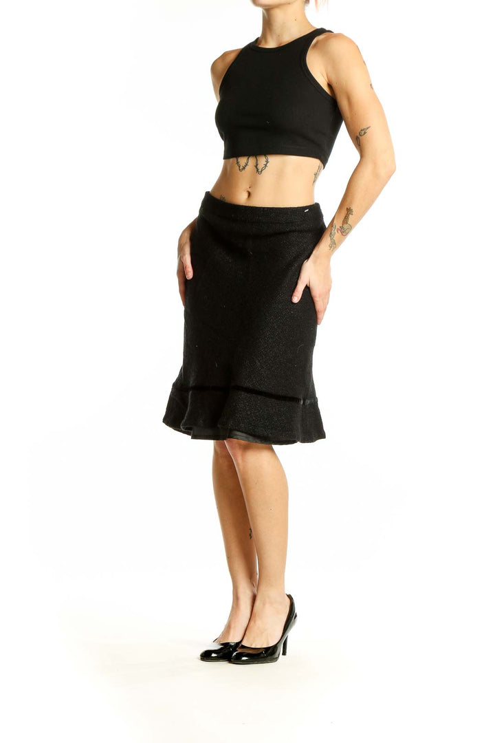 Front view of Athleta black wool blend flared skirt