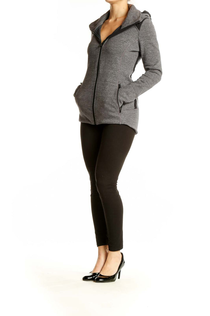 Front view of gray Athleta zip-up athletic jacket