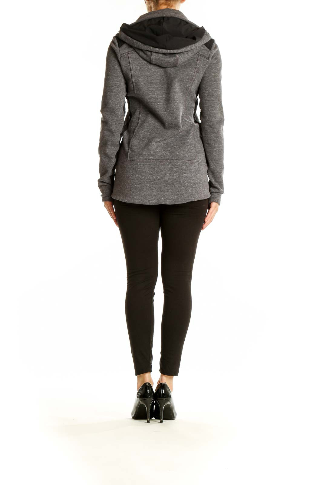 Back view of gray Athleta zip-up athletic jacket on model