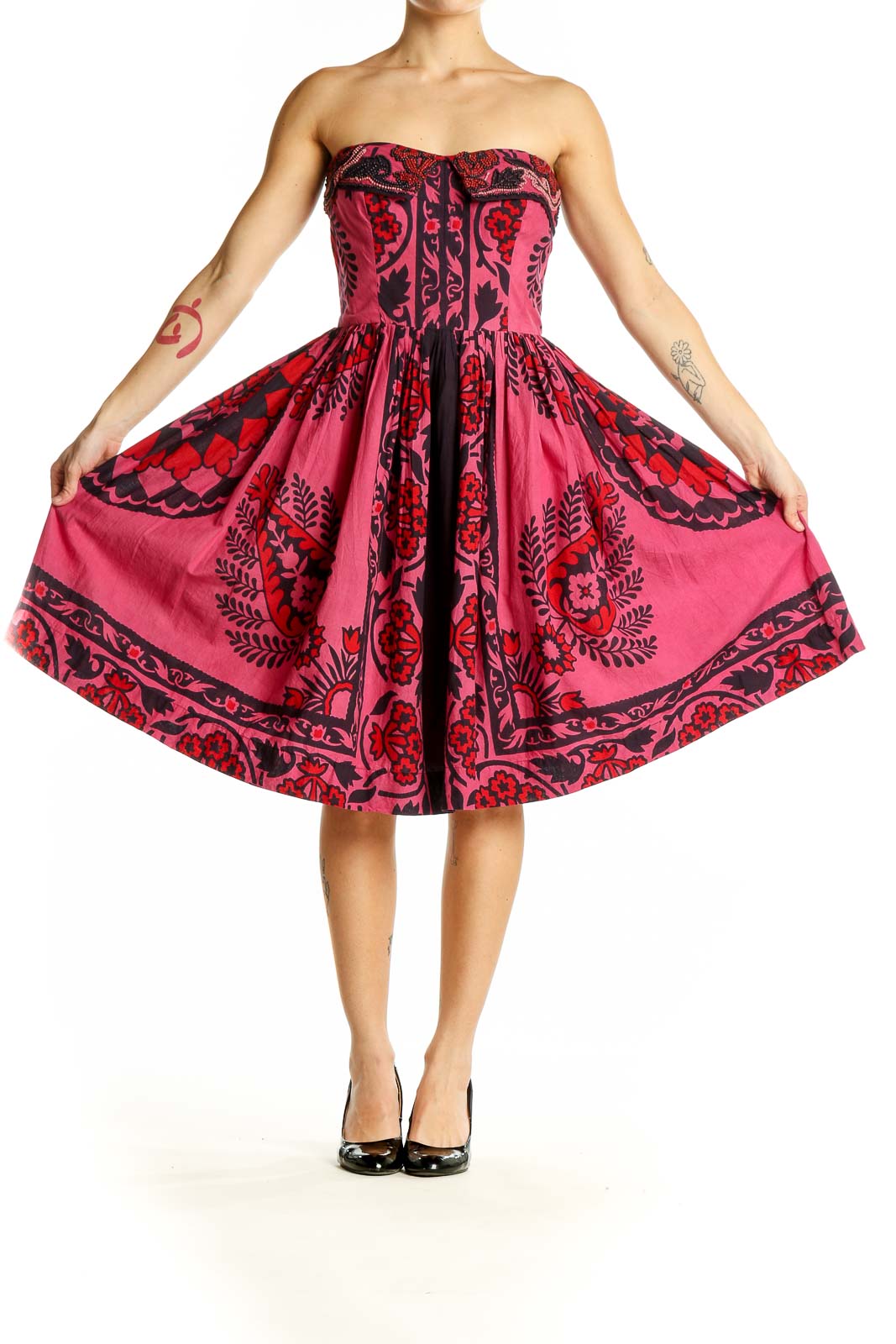 Front view of pink strapless Baraschi dress with black floral pattern