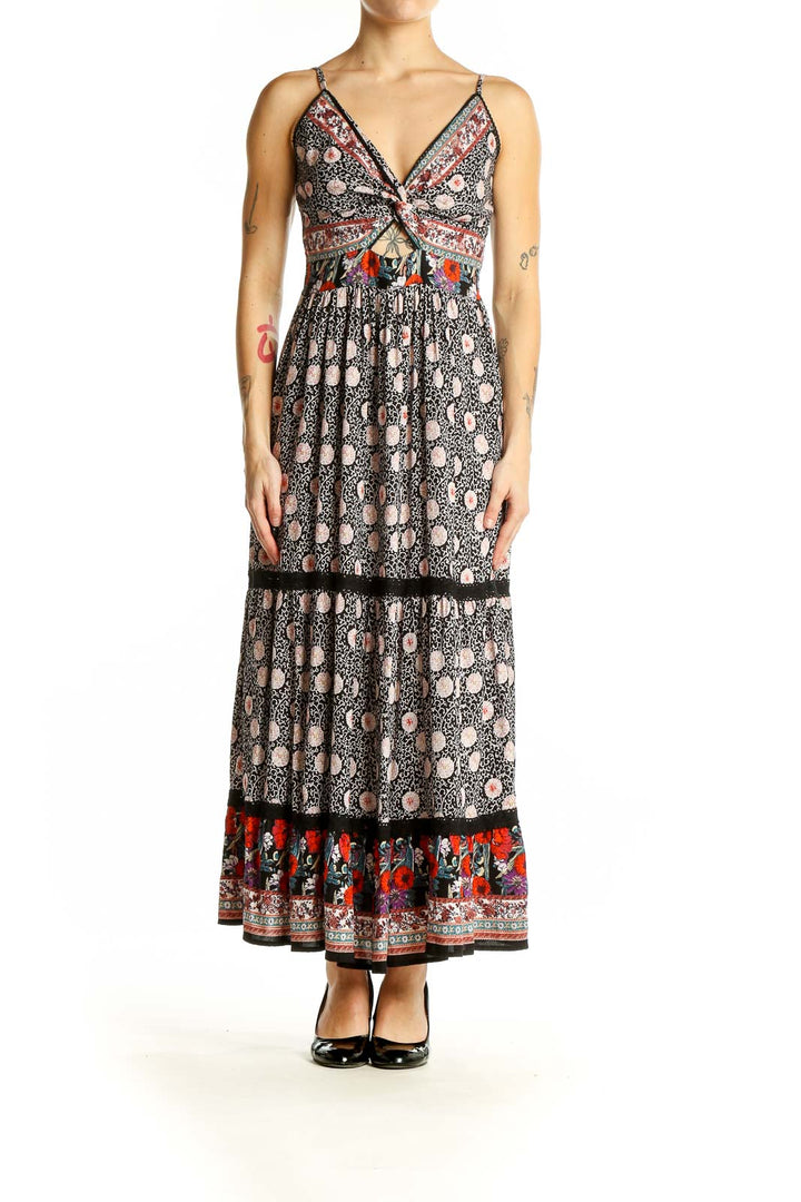 Front view of SilkRoll black floral maxi dress with cutout detail