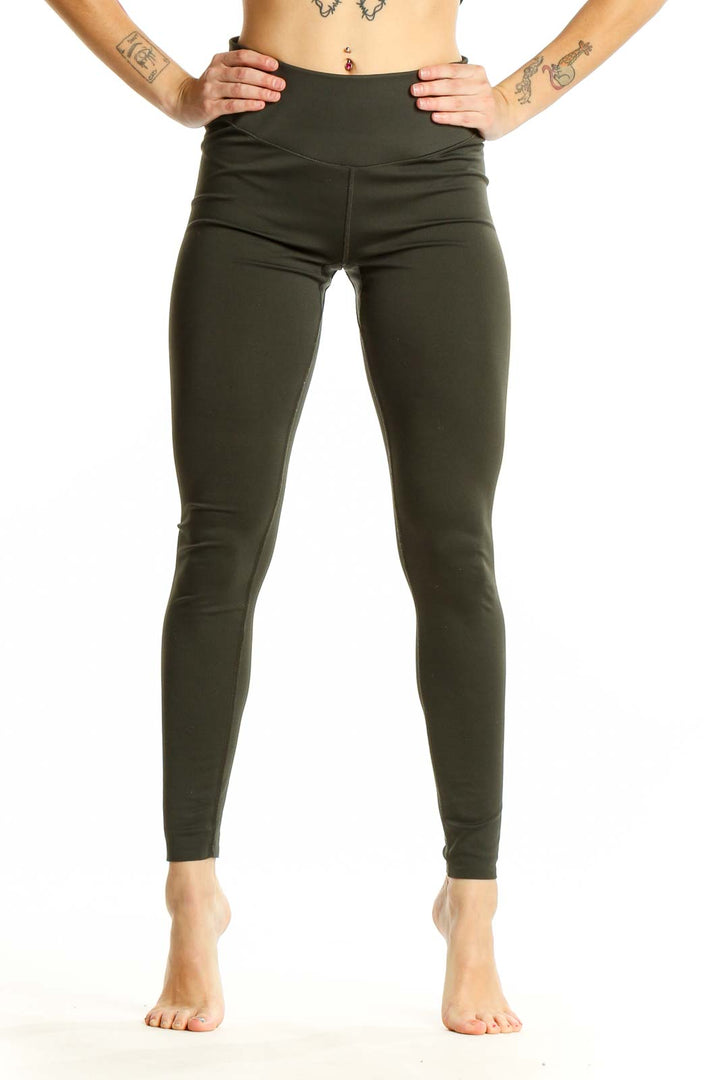 Front view of olive Uniqlo high-waisted performance leggings