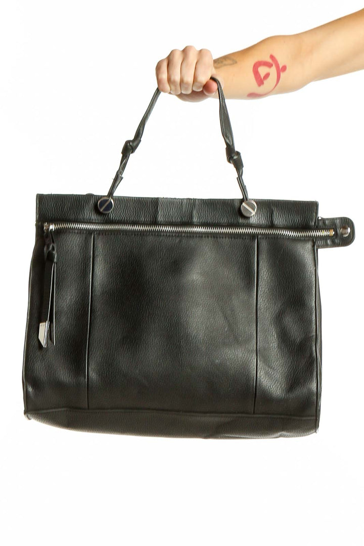 Front view of Foley + Corinna black leather tote bag with zipper detail