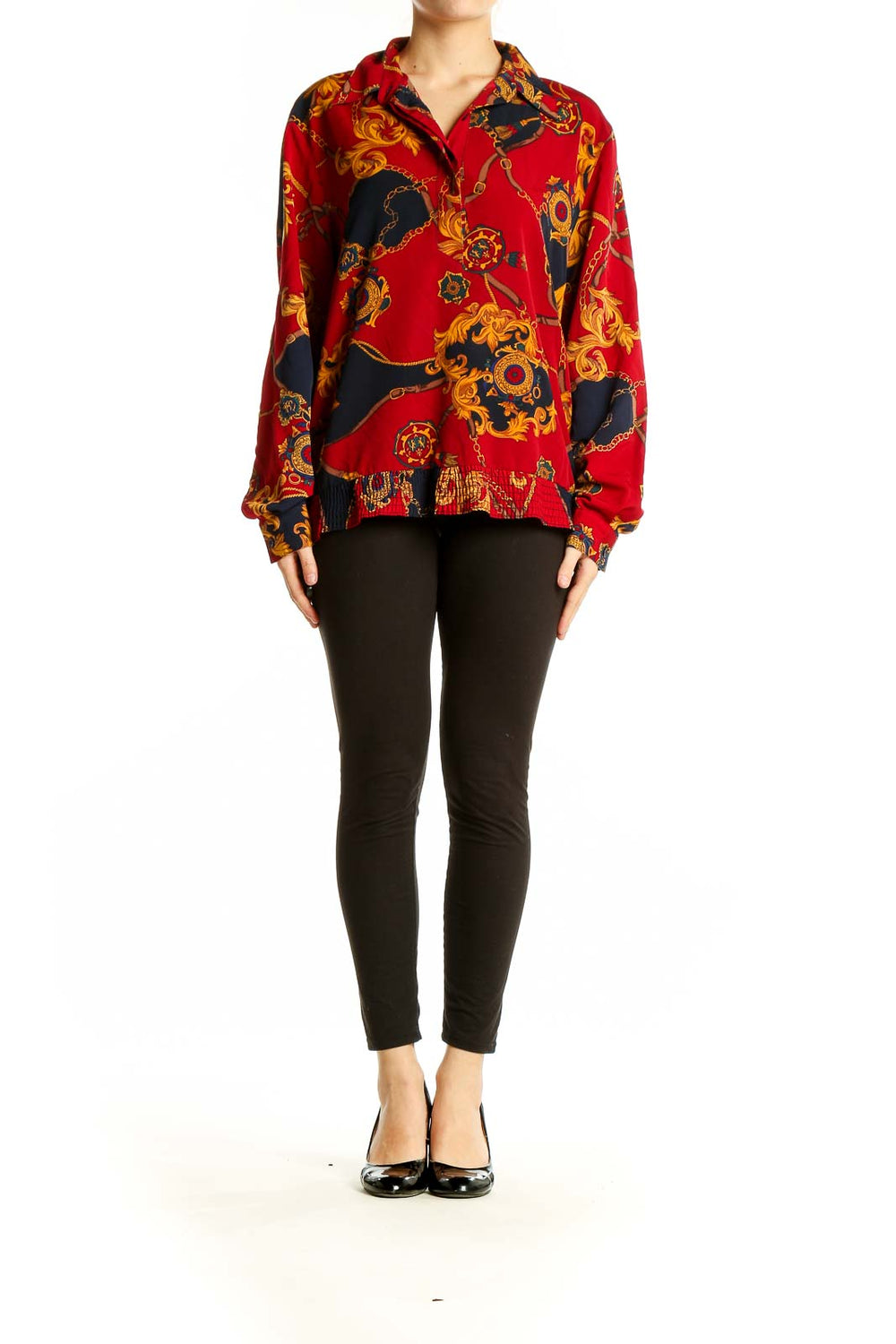 Front view of Alfred Dunner red blouse with ornate chain print and ruffle hem