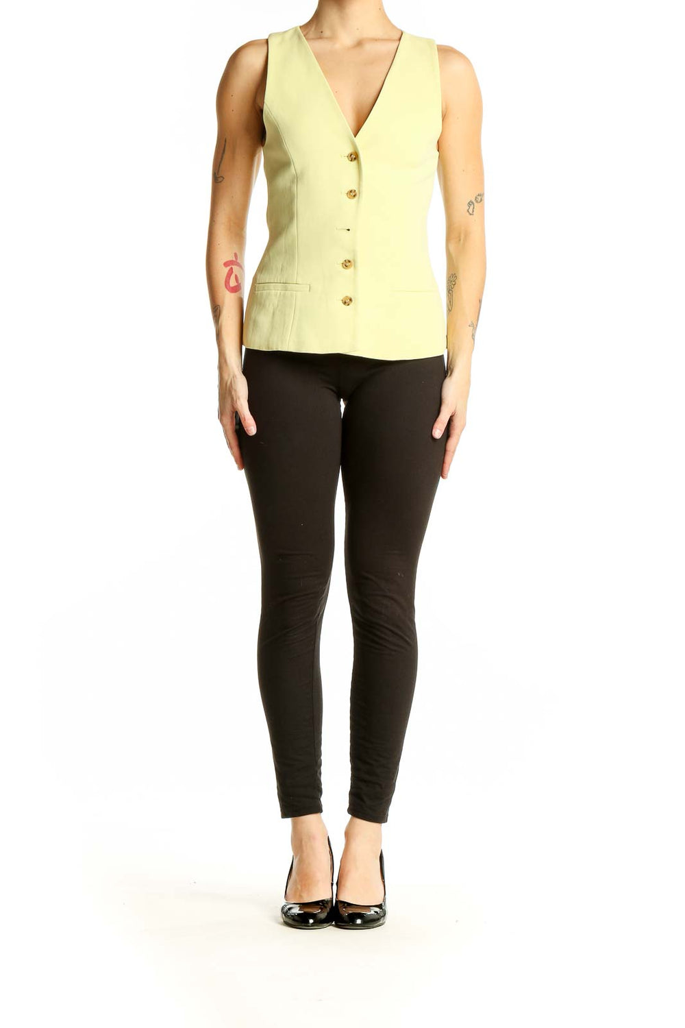 Front view of Zara pale yellow sleeveless button-front vest