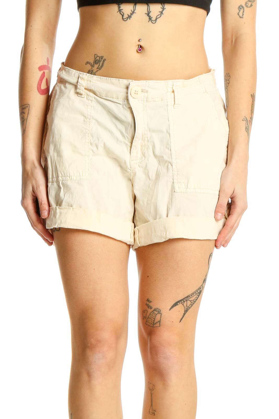 Front view of cream-colored Sanctuary cotton-blend shorts