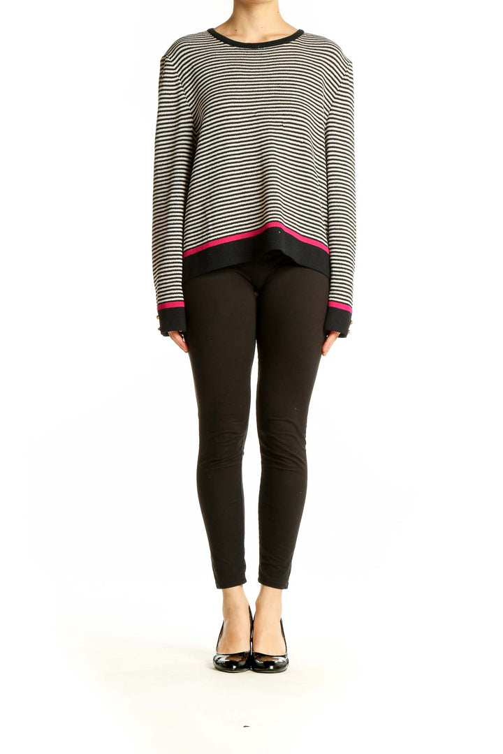 Front view of St. John Sport black and white striped knit sweater with pink trim