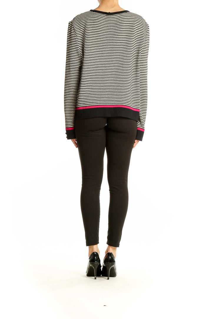 Back view of St. John Sport black and white striped knit sweater with pink trim