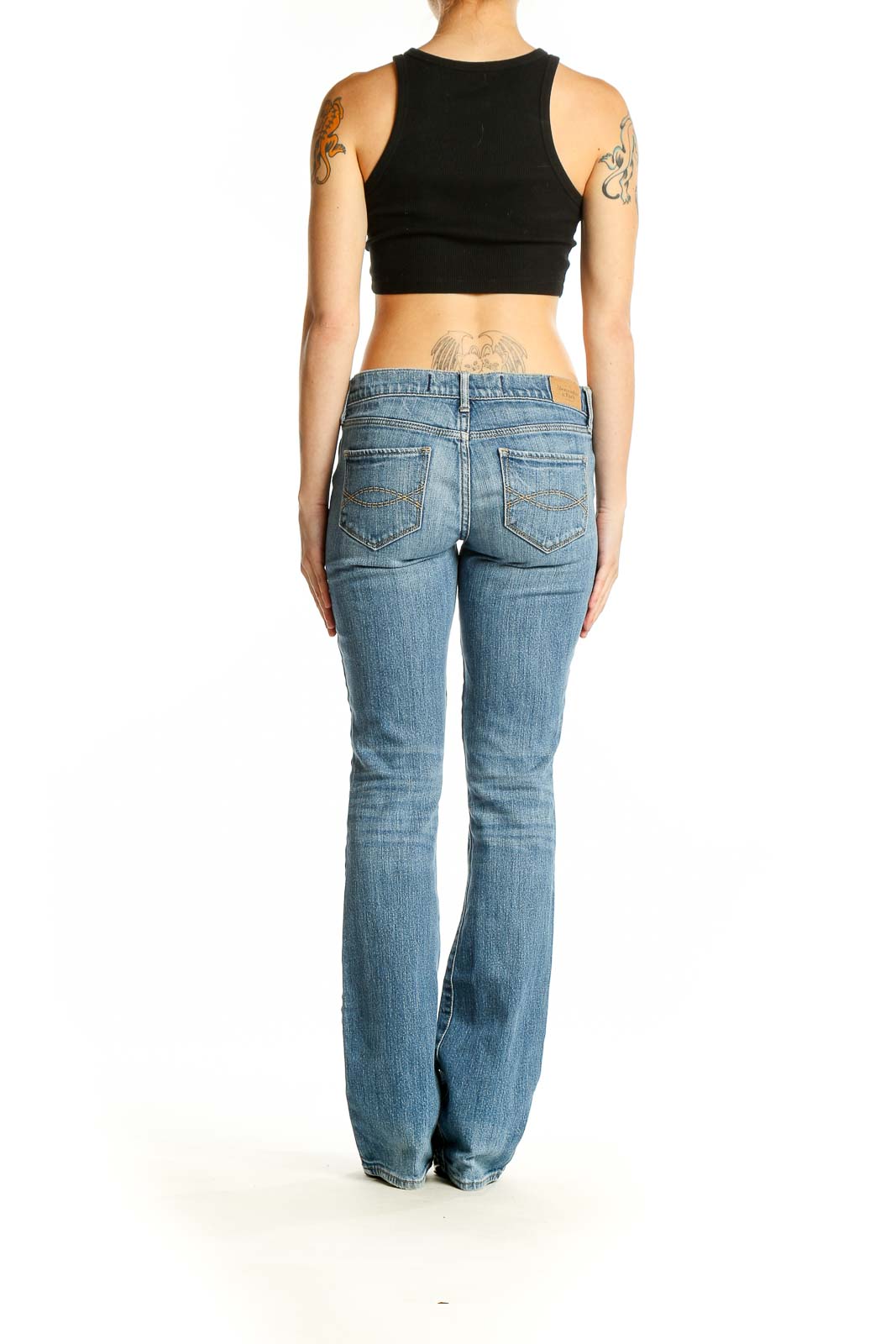 Back view of Abercrombie & Fitch light blue bootcut jeans on model