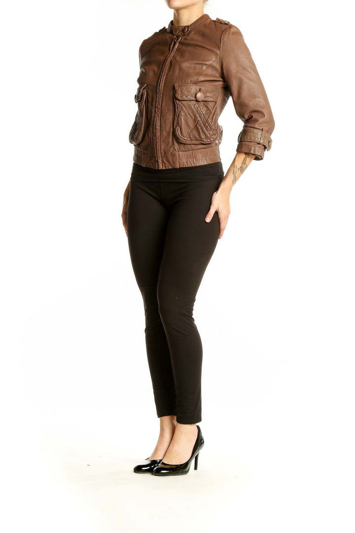 Front view of Charlotte Ronson brown leather cropped moto jacket