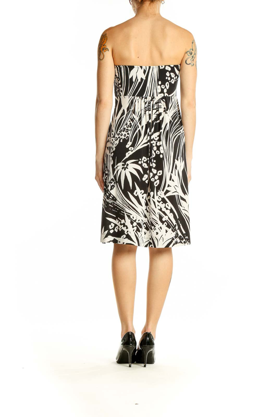 Side view of Soma black and white floral strapless dress