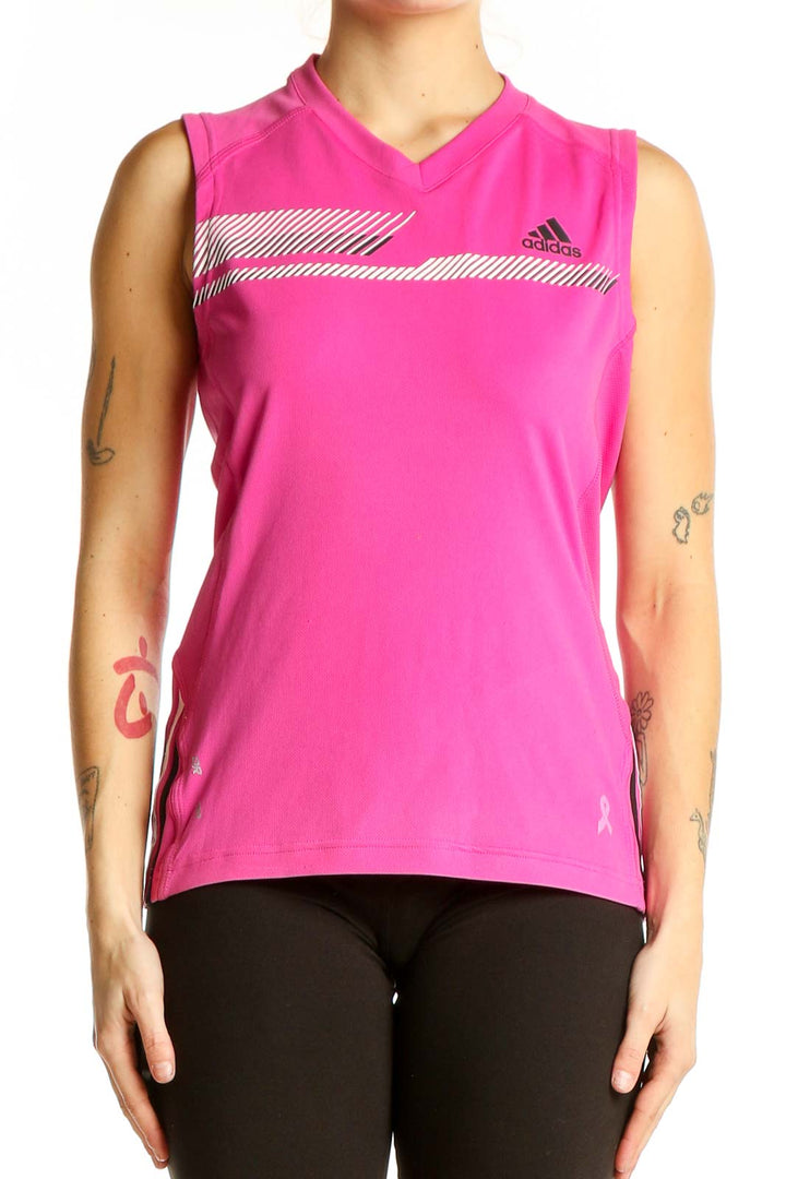 Front view of pink Adidas sleeveless tank top with white stripe detail