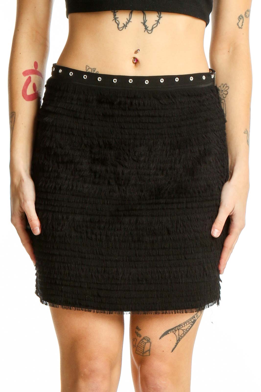 Front view of Madison Marcus Black Textured Fringe Mini Skirt with grommet waistband