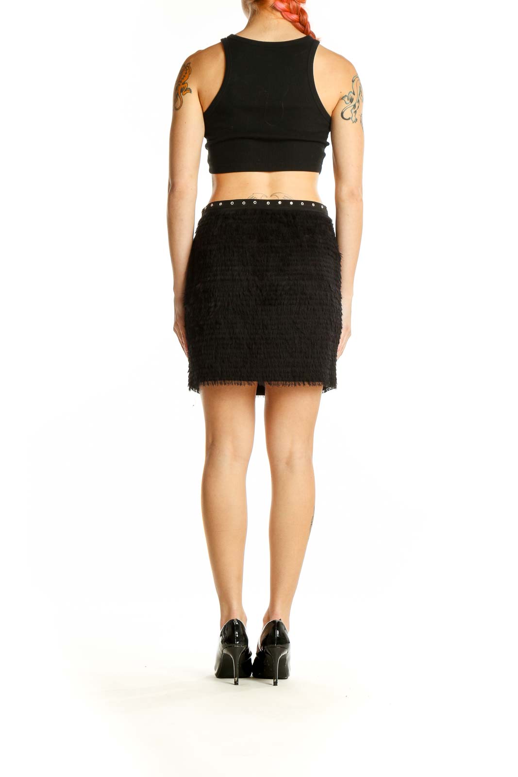 Full body view of model wearing Madison Marcus Black Textured Fringe Mini Skirt with crop top