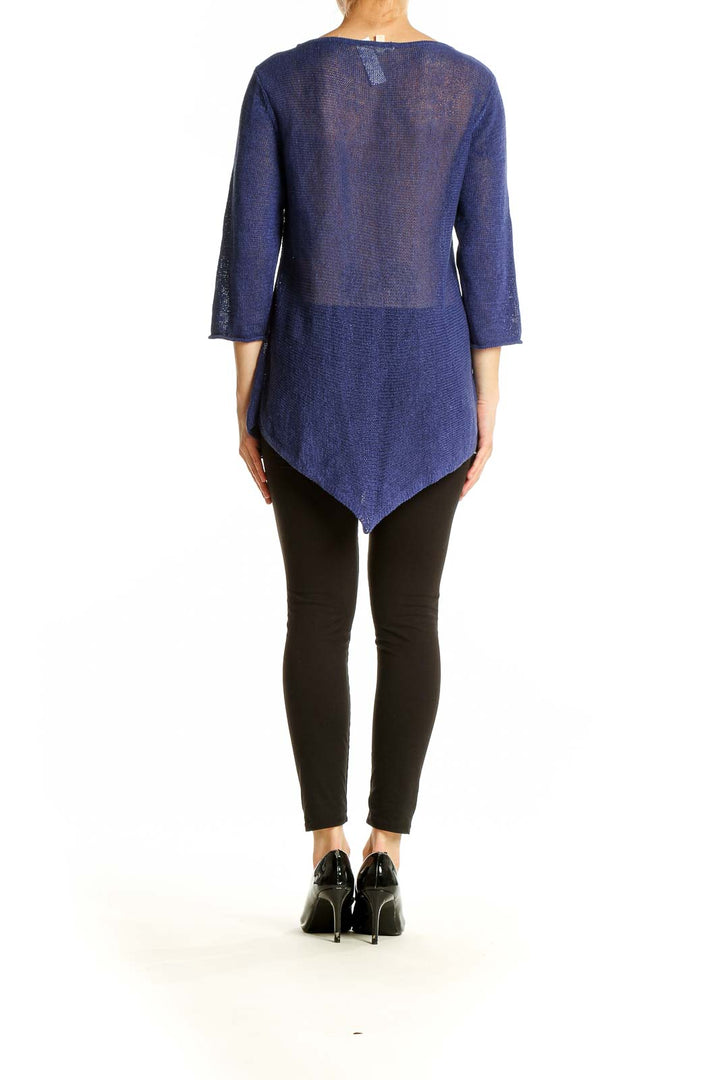 Side view of Eileen Fisher navy sheer knit tunic showing drape and fit