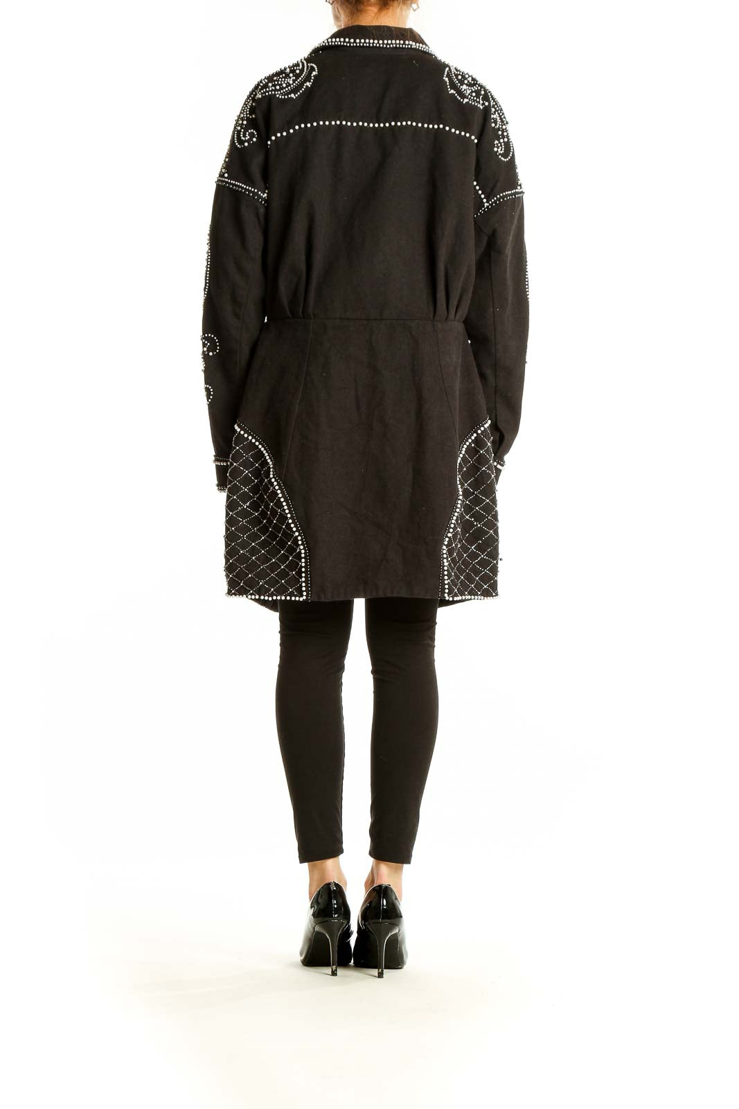 Back view of ASOS black oversized jacket showing full embellishment pattern