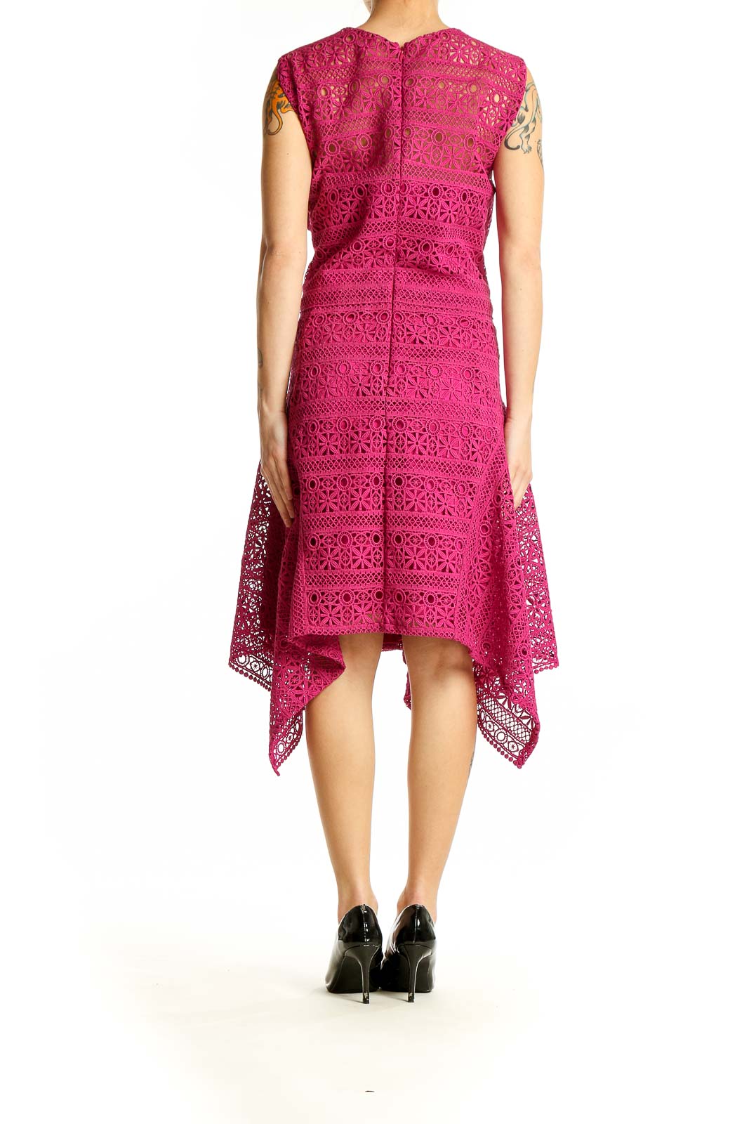 Side view of Theia fuchsia lace dress showing handkerchief hem detail