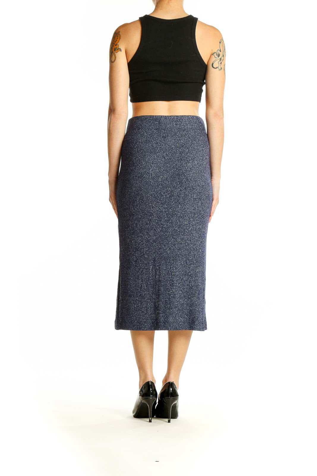 Back view of Banana Republic navy ribbed midi pencil skirt on model with black crop top