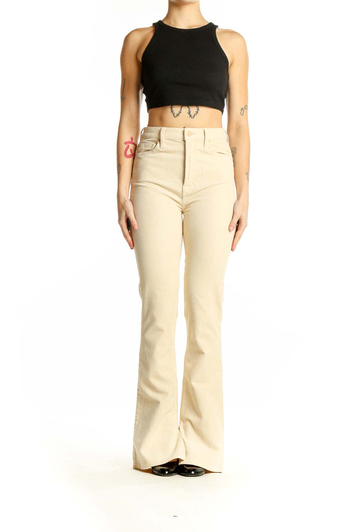 Front view of 7 For All Mankind cream high-waisted flared pants