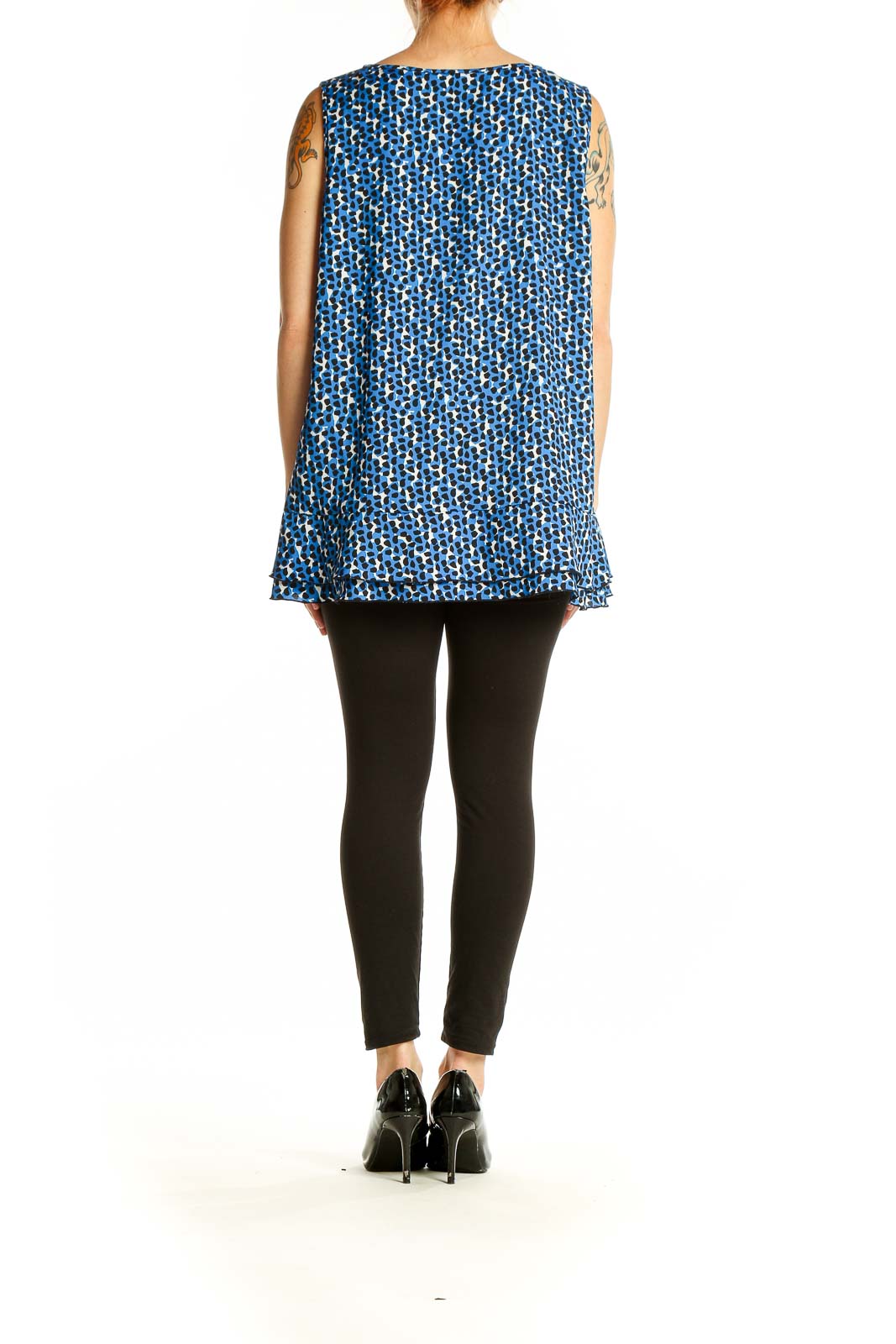 Back view of Ann Taylor blue patterned sleeveless blouse showing flowy silhouette