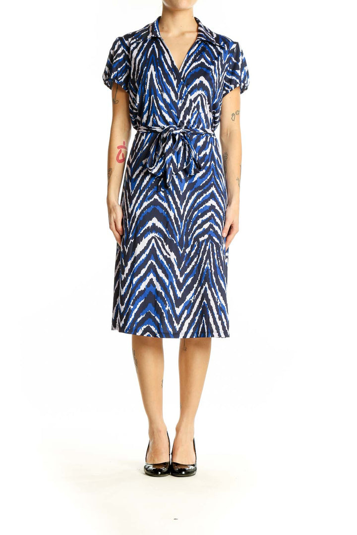 Front view of INC blue zebra print wrap dress with short sleeves