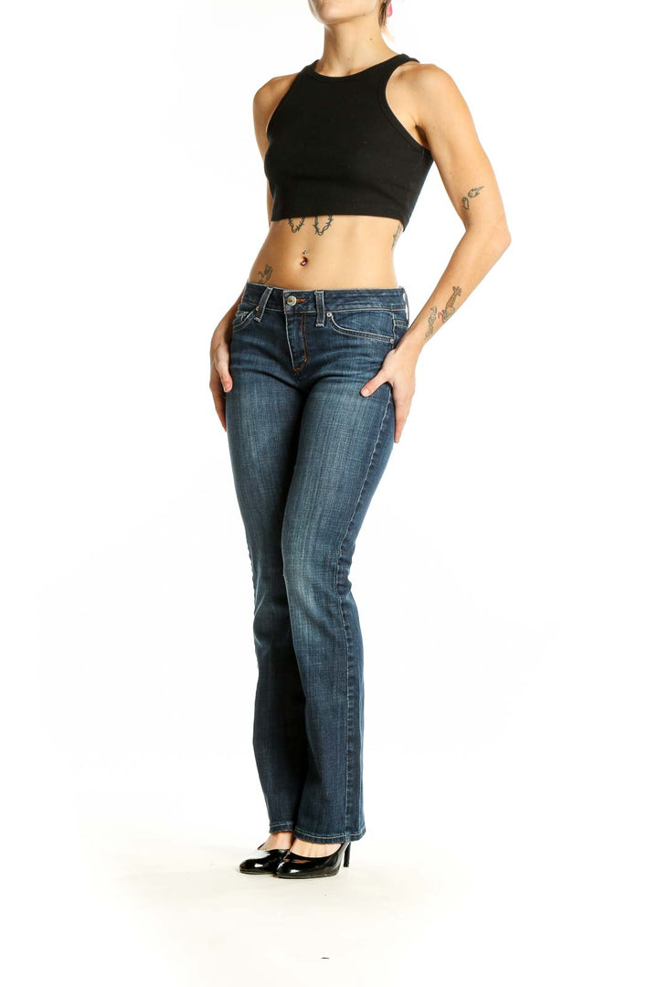 Front view of Joe's blue straight leg jeans on model