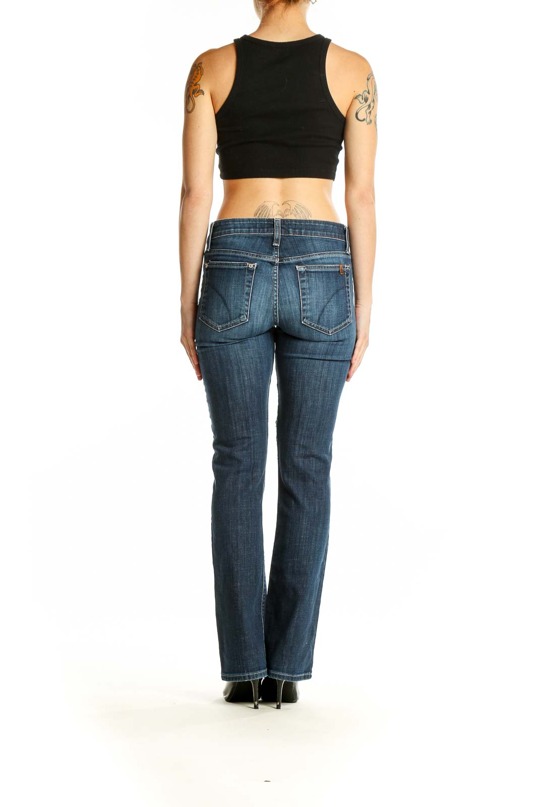 Back view of Joe's blue straight leg jeans on model