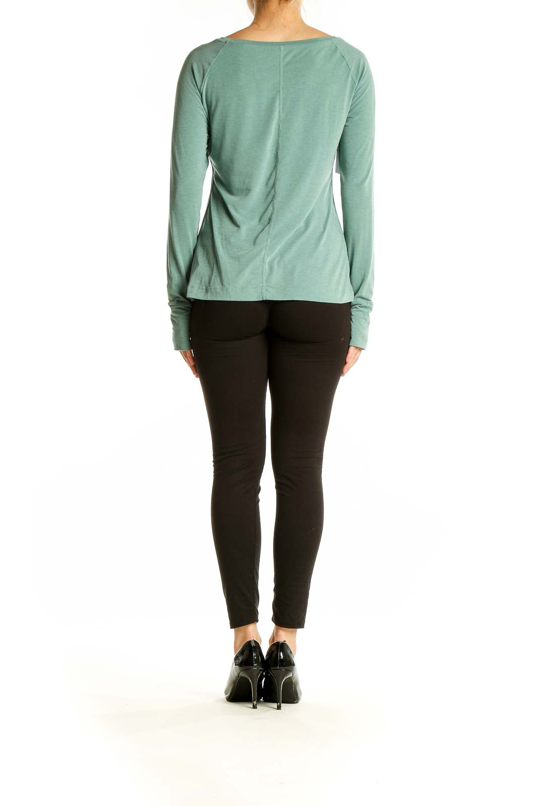 Back view of sage green GapFit long sleeve athletic top on model