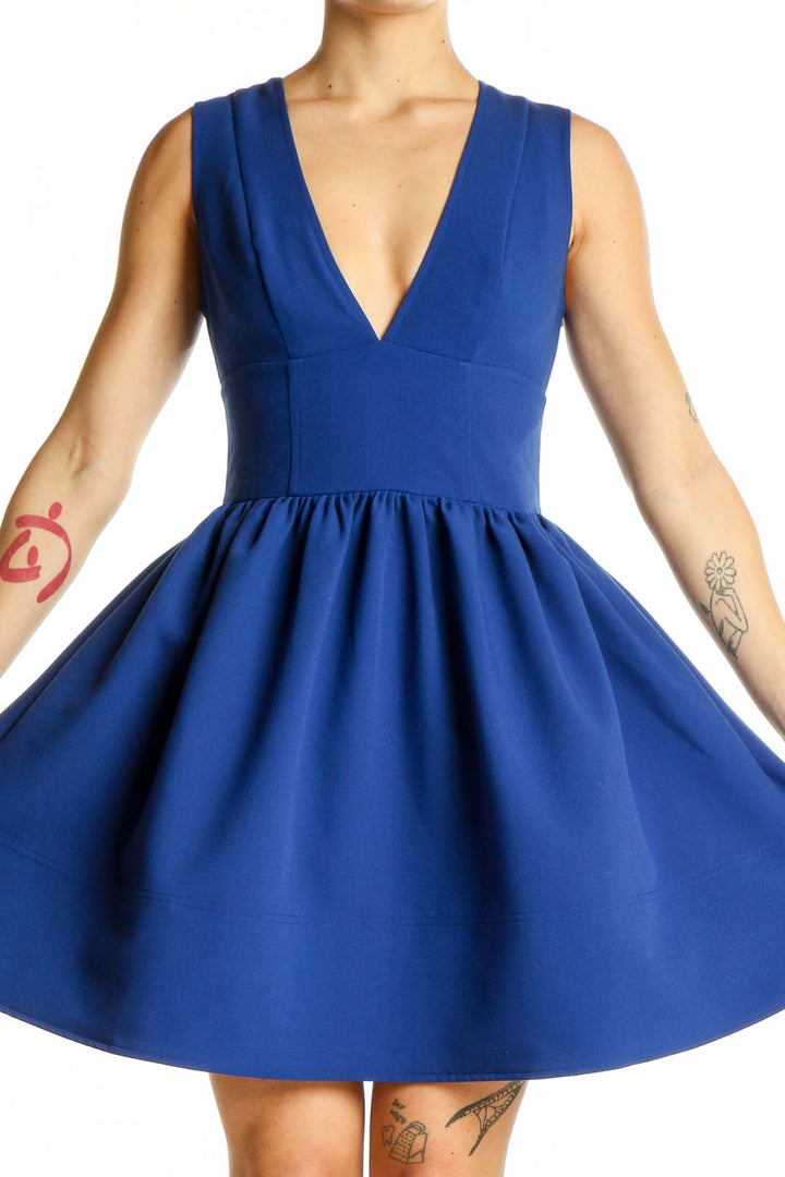 Front view of royal blue fit-and-flare cocktail dress with V-neckline