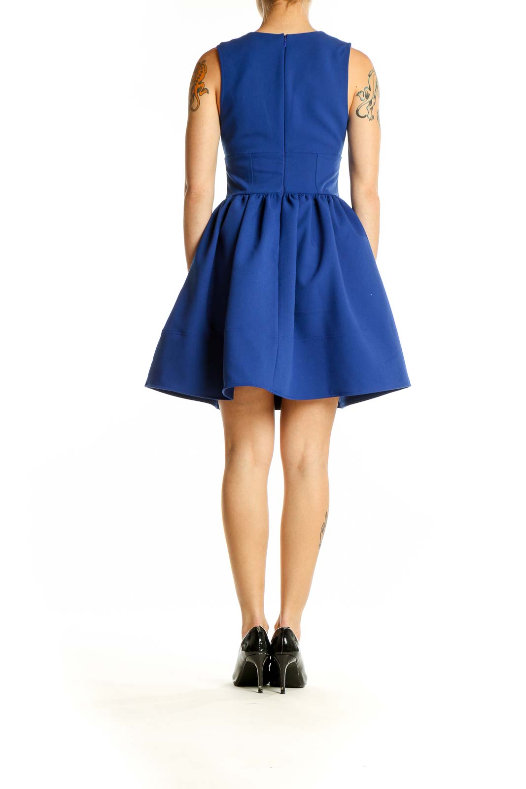 Side view of royal blue fit-and-flare cocktail dress showing full skirt