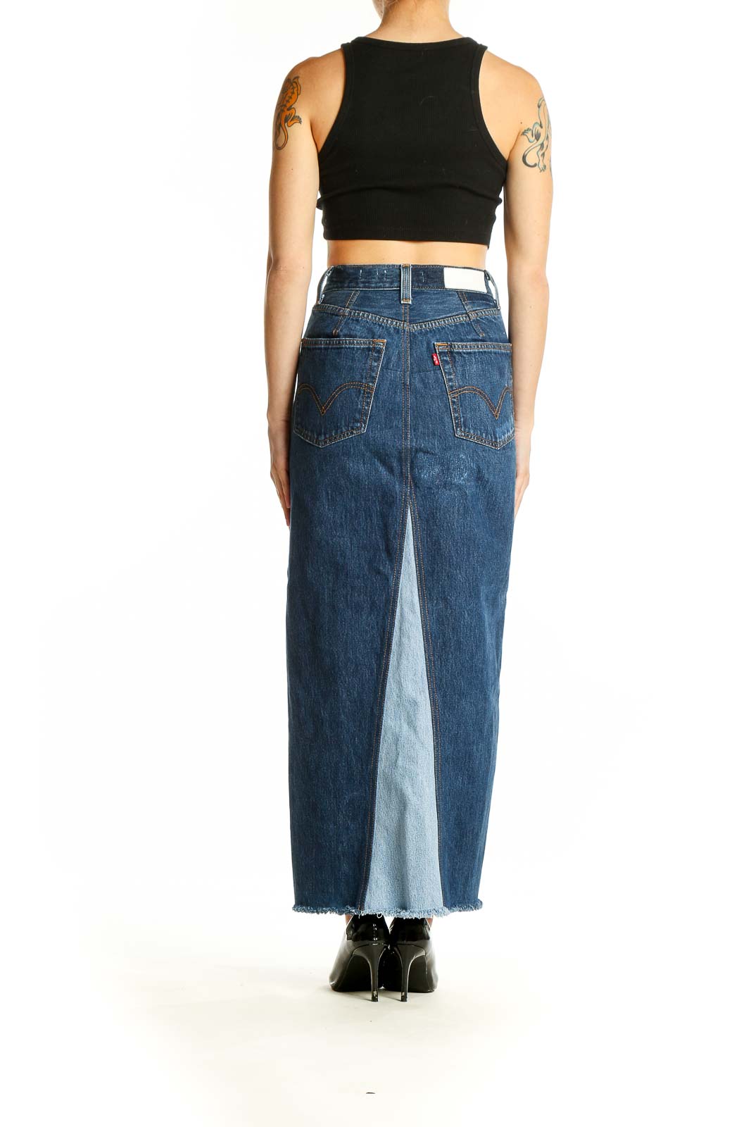 Back view of RE DONE LEVIS blue denim high-waist maxi skirt showing raw hem