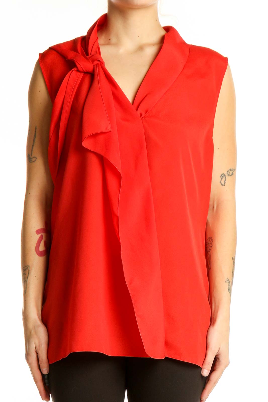 Front view of red Tahari sleeveless blouse with tie-neck detail