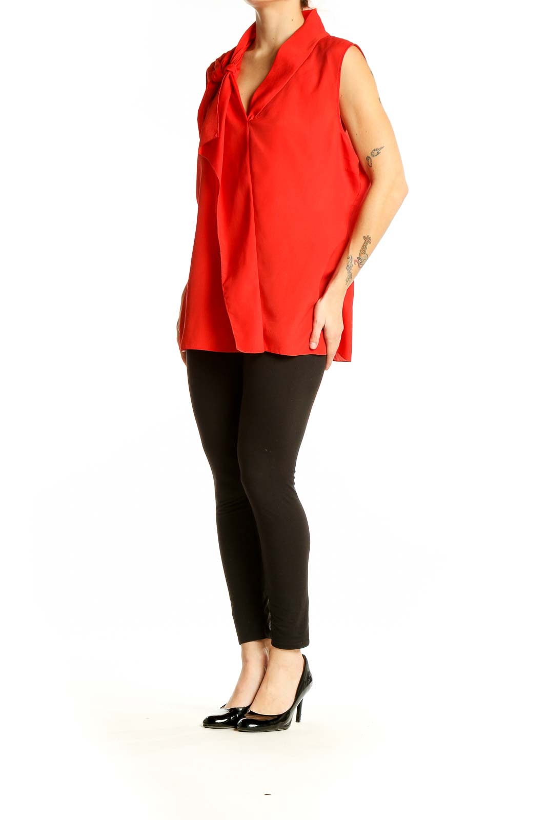 Front view of red Tahari sleeveless blouse with tie-neck detail