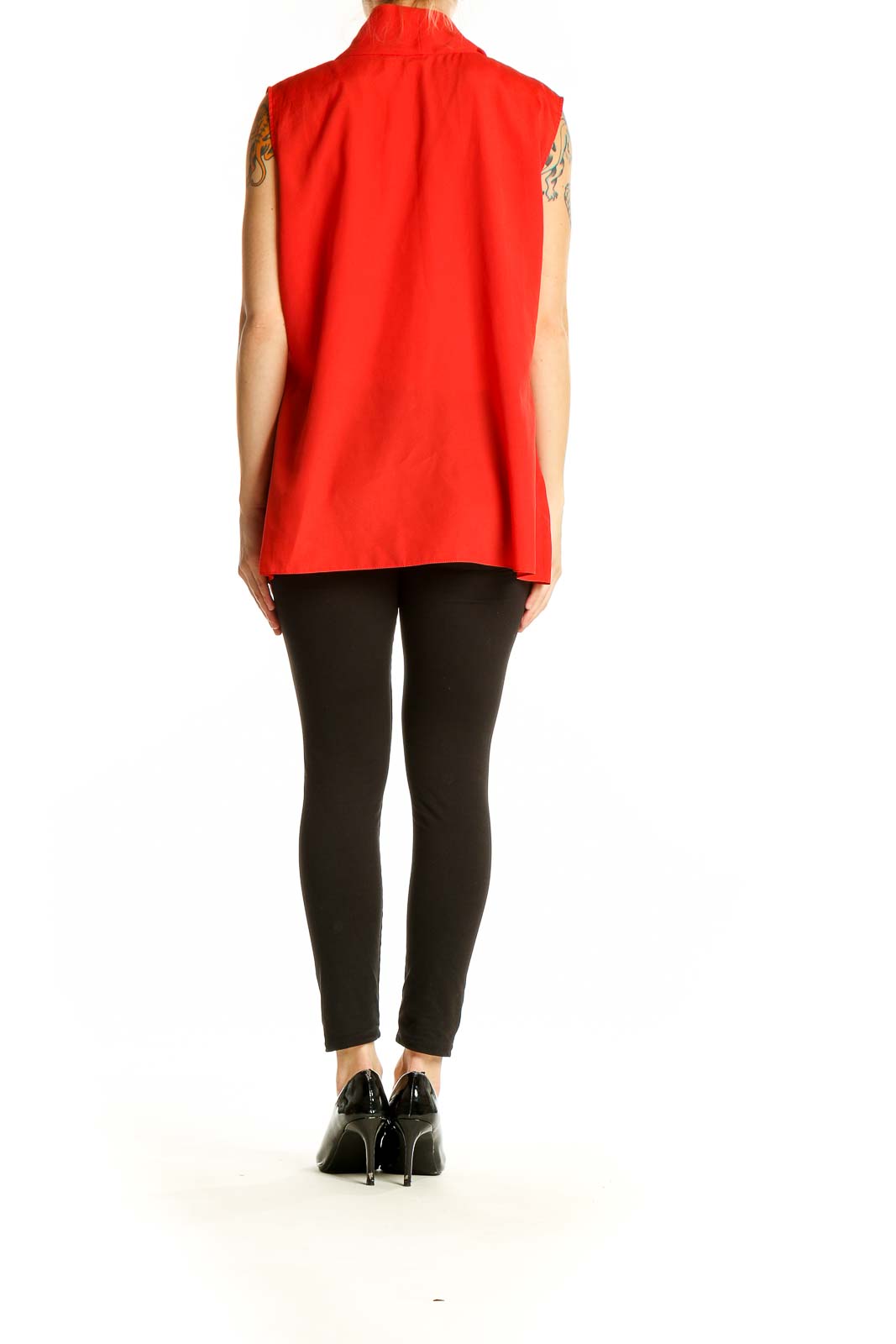 Side view of red Tahari sleeveless blouse showing relaxed fit