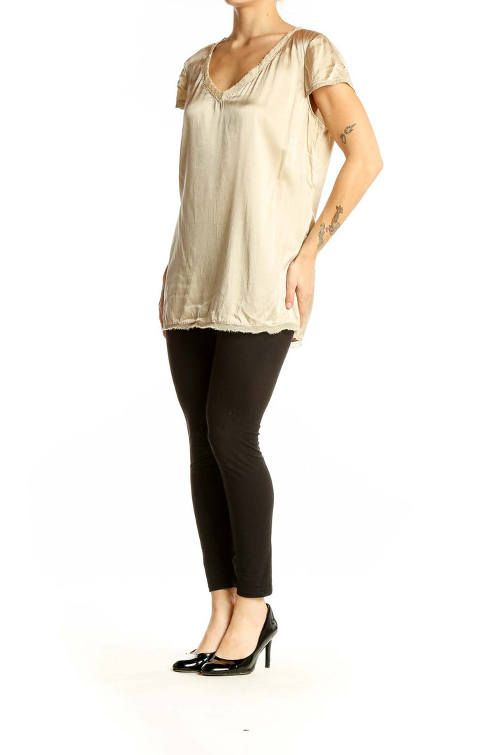 Front view of Elie Tahari beige silk blend V-neck top