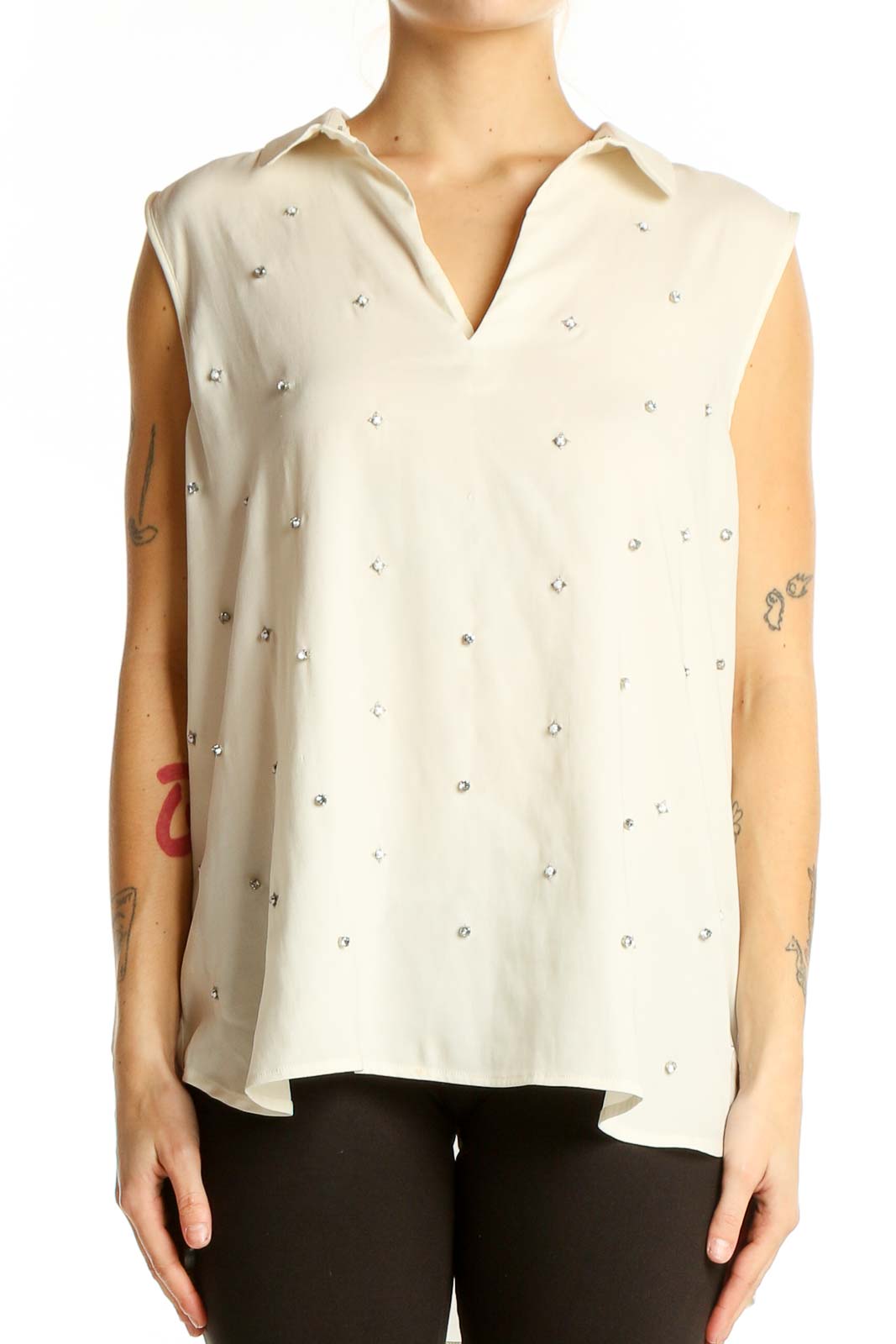 Front view of Ann Taylor ivory sleeveless blouse with crystal embellishments