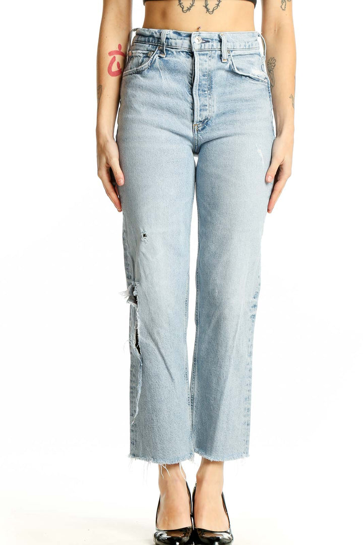 Front view of Citizens of Humanity light blue distressed straight leg jeans