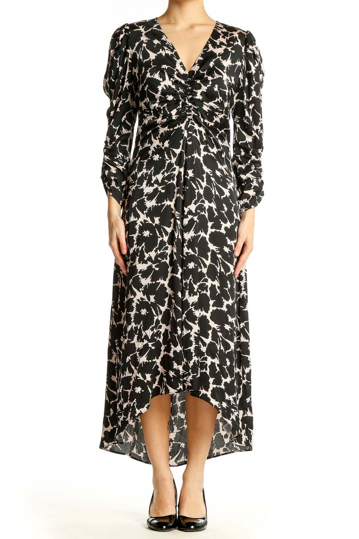 Front view of Gap black floral print maxi dress with V-neck and long sleeves