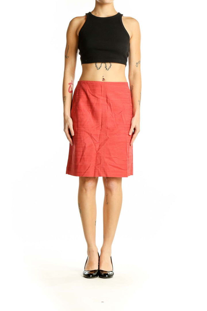 Front view of Ann Taylor coral textured pencil skirt