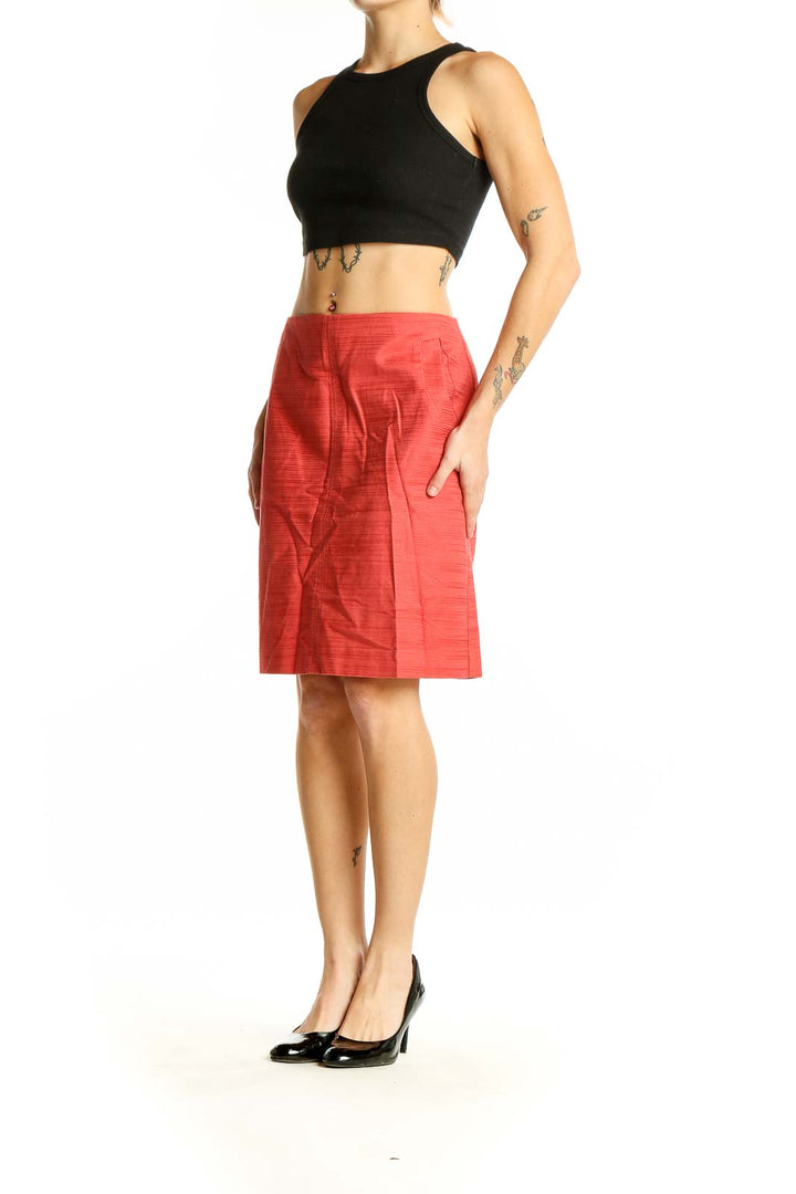 Front view of Ann Taylor coral textured pencil skirt