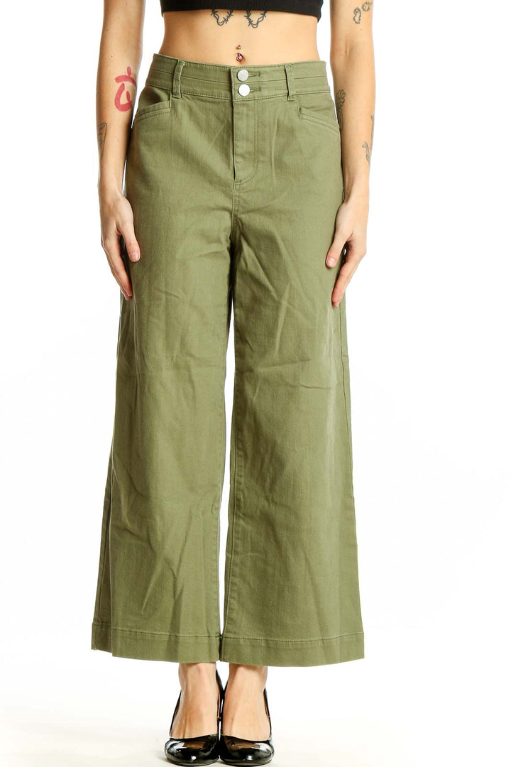 Front view of LOFT olive wide-leg pants with high waist and double-button closure