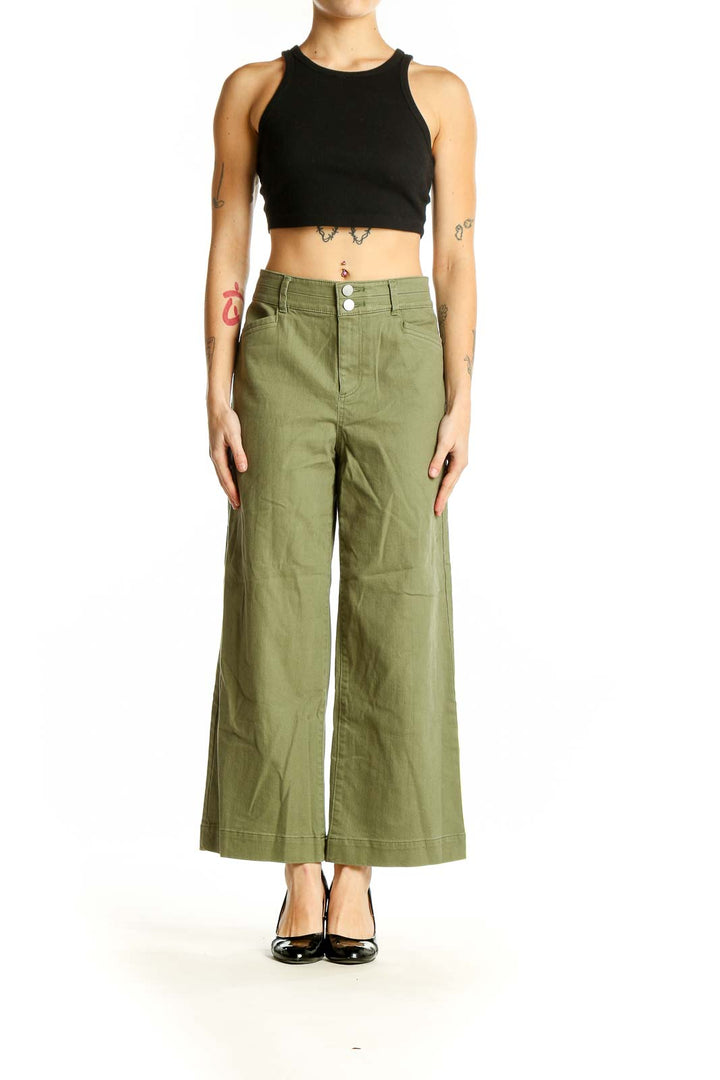 Front view of LOFT olive wide-leg pants with high waist and double-button closure